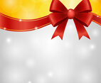 Red Ribbon Bow with Glowing Gold and Silver Background