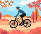 A Man Biking in Autumn