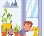 Boy Plays with His Cat at Home